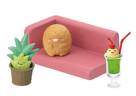 Sumikkogurashi Café Comfy Sofa miniature set with Tonkatsu on a pink sofa, a Zassou potted plant, and a green cream soda.