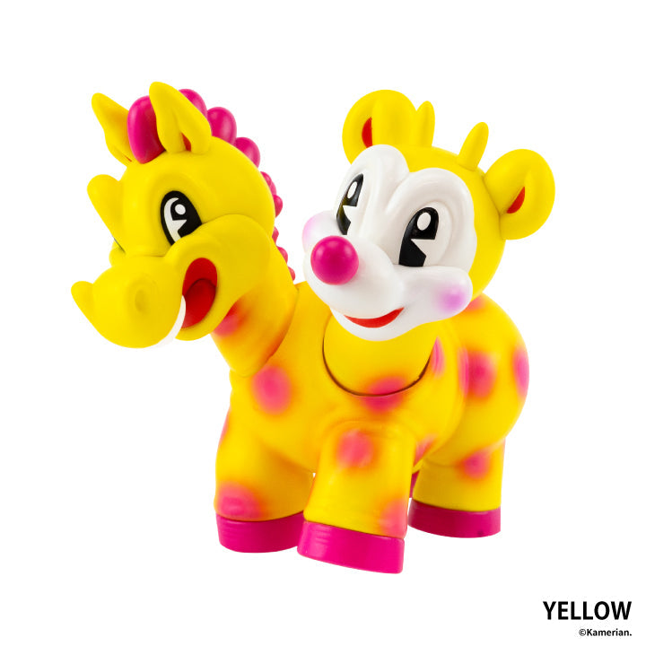 Yellow UMASHIKA two-headed figure with pink accents on a white background
