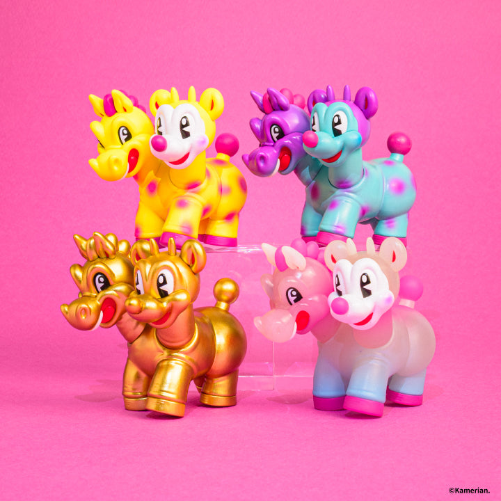 All four UMASHIKA figure designs together on a bright pink background