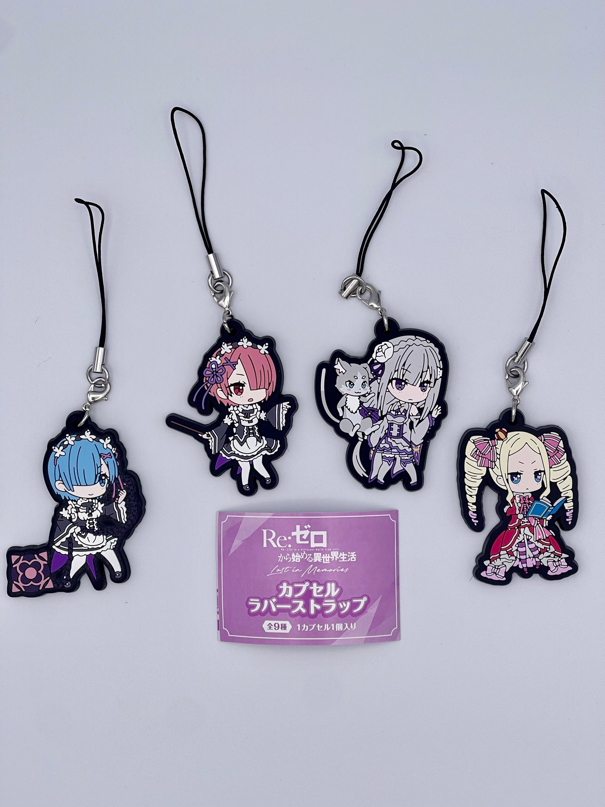 Re:ZERO gachapon capsule packaging - authentic Japanese collectible showing Emilia, Rem, Ram, and Beatrice.